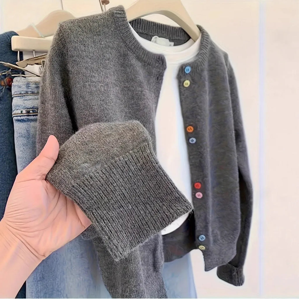 Dark grey women's button-front cardigan sweater for commute and workwear layering