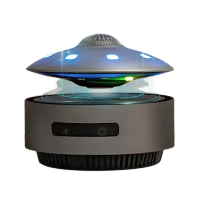 Automatic lifting magnetic levitation Bluetooth speaker floating above charging base