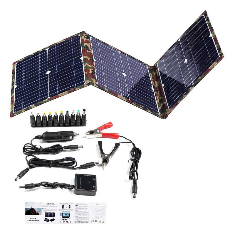 Black foldable 36W portable solar panel unfolded, showing its solar cells and included car charger and USB accessories.