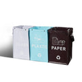 Blue polypropylene rubbish bin with lid and handle, 40-litre capacity, dimensions 30cm by 50cm by 30cm.