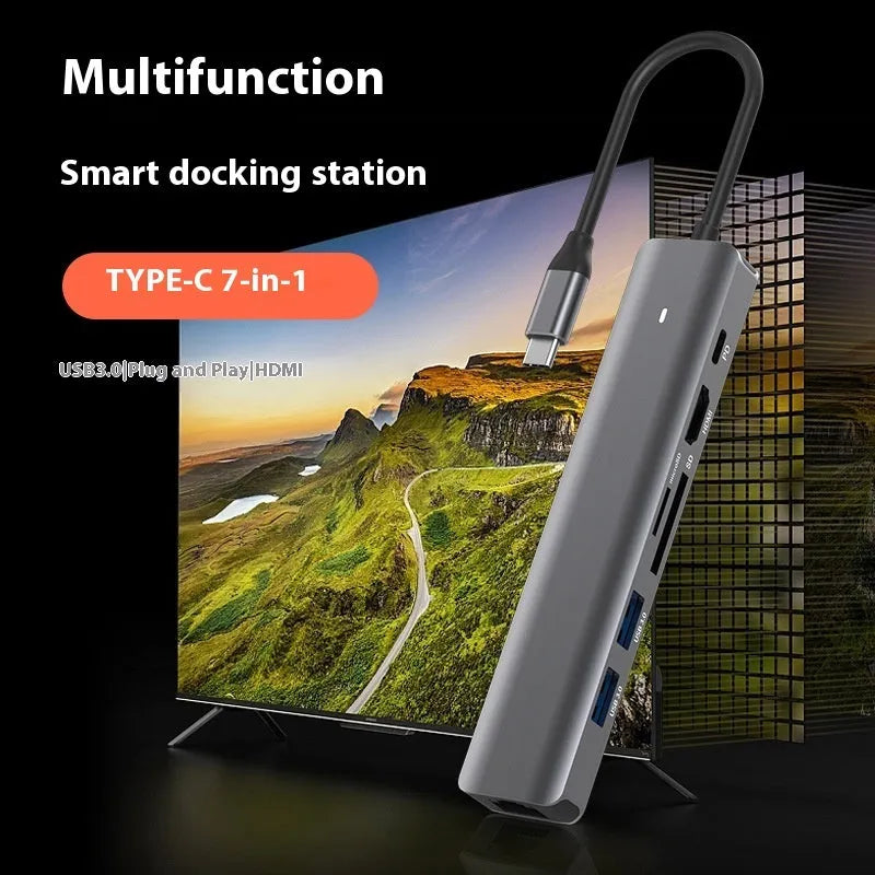 7-in-1 USB-C hub with SD card reader, MicroSD slot, HDMI port, USB 3.0 ports, and PD charging