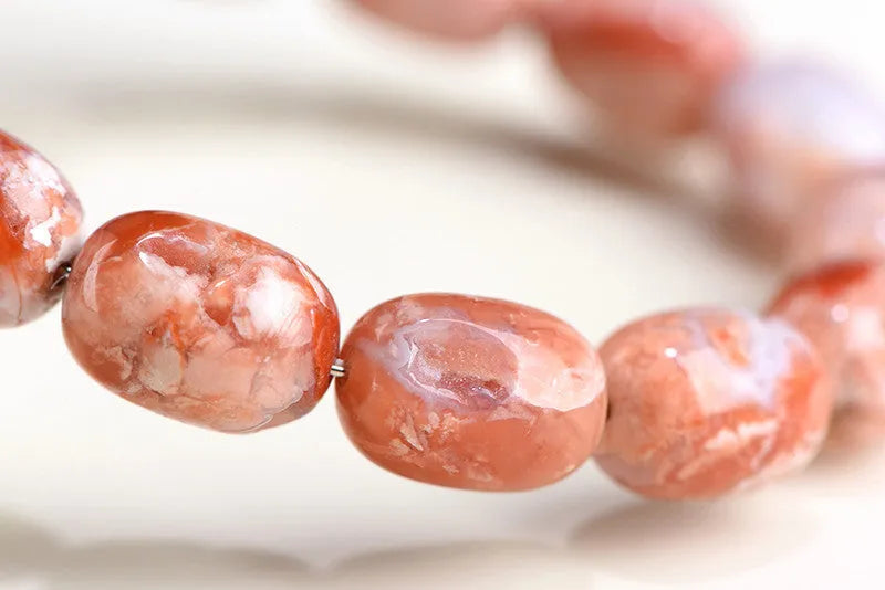 Natural cherry agate barrel bead bracelet with geometric design and ruyi elements
