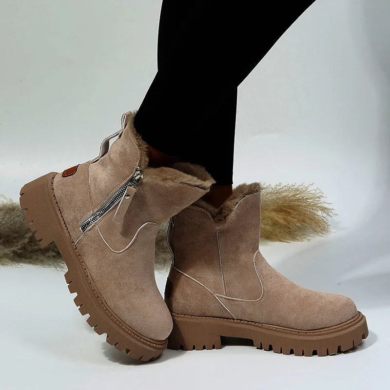 Women's black high-top plush snow boots with a side zipper and thick rubber sole