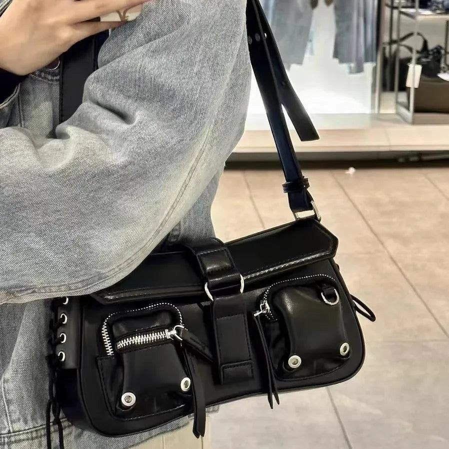 Black baguette-style women's messenger bag with a single crossbody strap