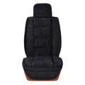 Winter car seat cushion with plush surface in grey colour on car seat