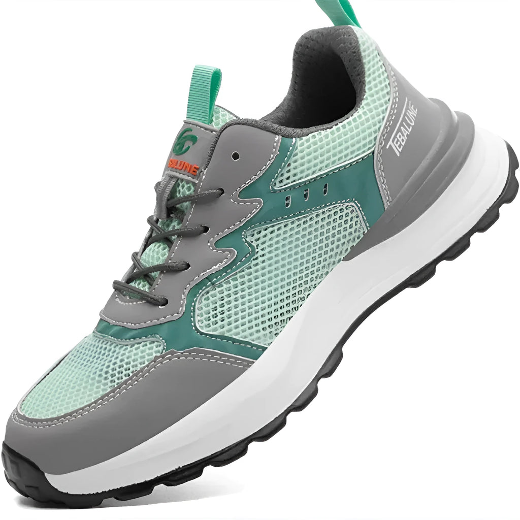 Green low-top work safety shoes with mesh panels and a plastic toe cap on a TPU sole.