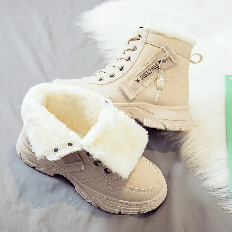 Plus size women's snow boots in black with fleece lining and lace-up front