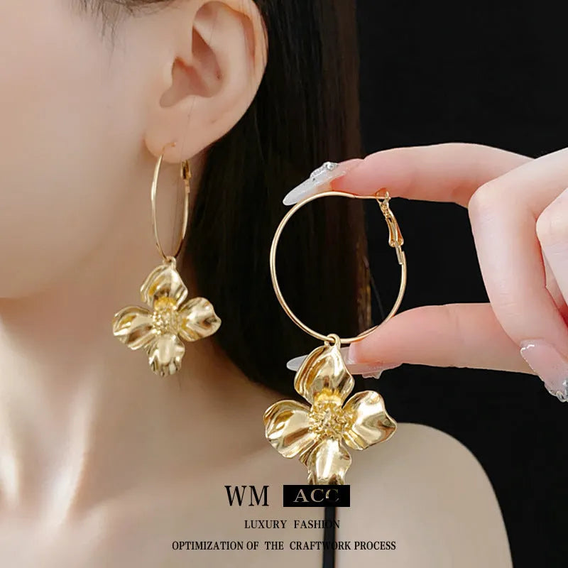 Silver needle metal flower earrings with geometric design in gold or silver electroplated finish