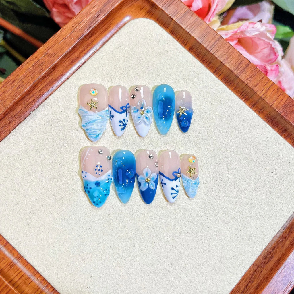 Blue hand-painted carved summer ice transparent plastic fake nails with decorative surface texture
