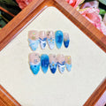 Blue hand-painted carved summer ice transparent plastic fake nails with decorative surface texture