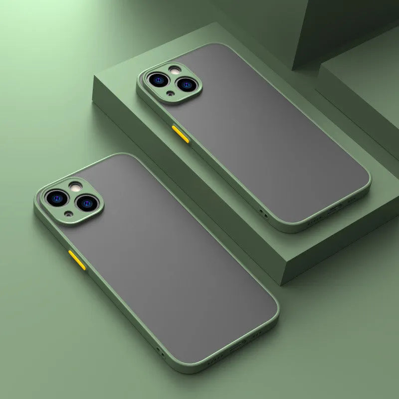 Black frosted hard iPhone case with full camera lens cover and fine hole skin-sensing design on a table.