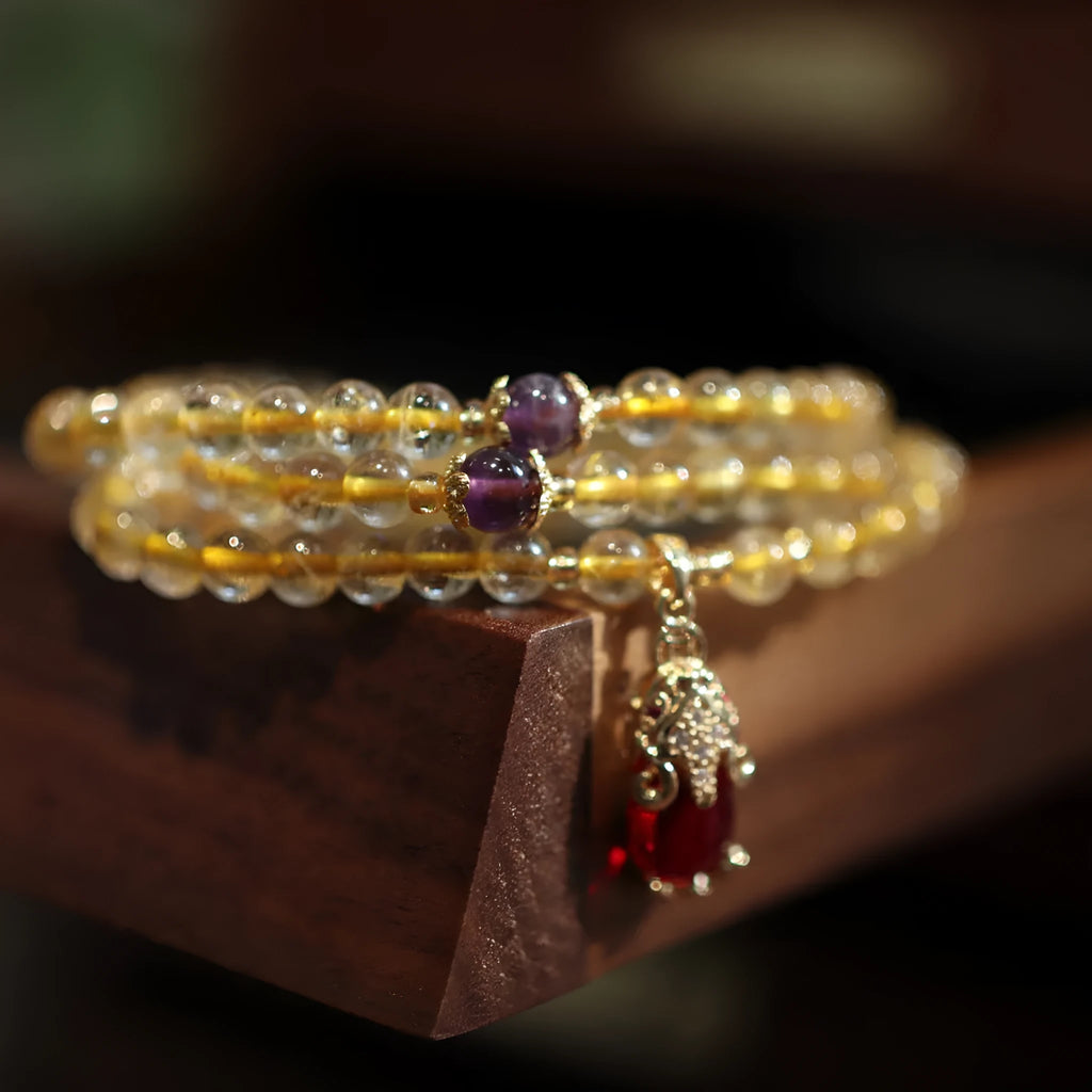 Natural Brazil gold rutilated quartz bracelet with Chinese style design and ruby quartz hanging chopsticks