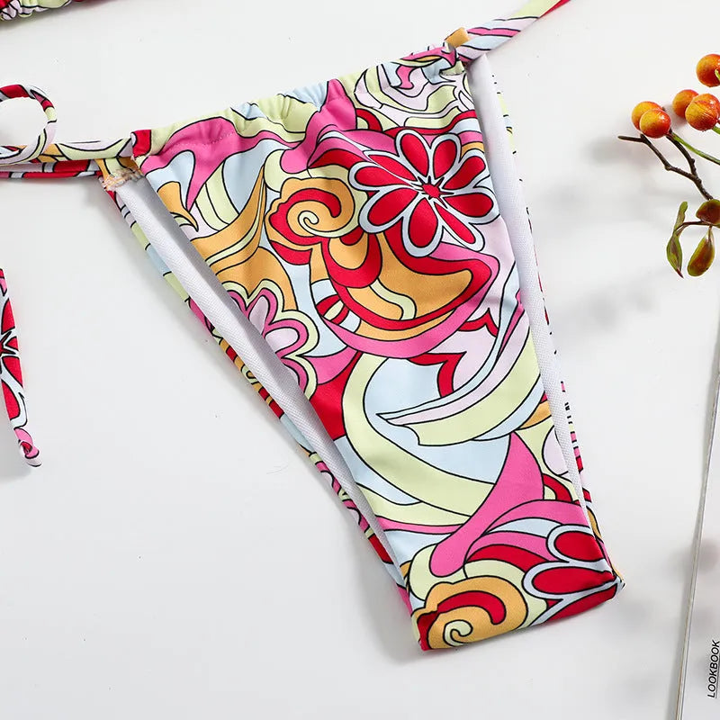 Women's triangle printed bikini swimsuit with adjustable hanging neck strap on polyester fabric