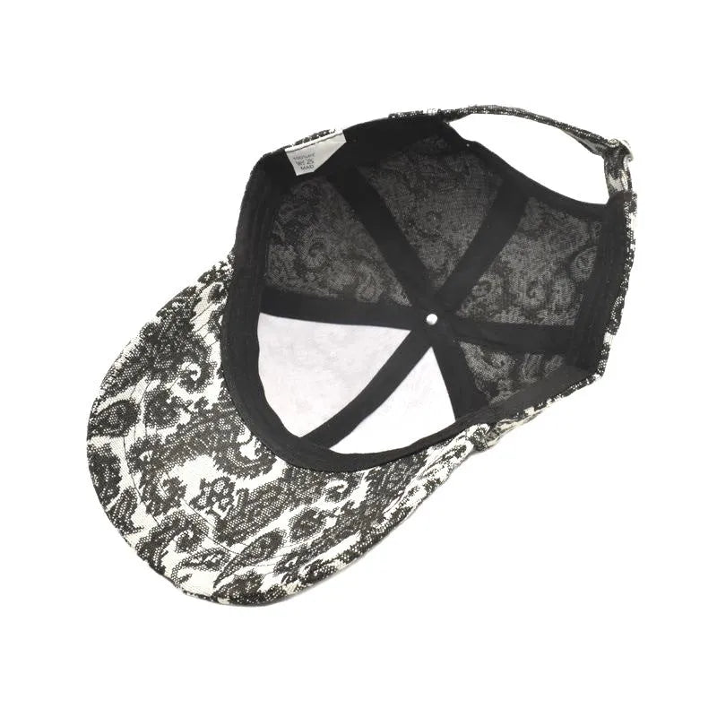 Polyester baseball cap with paisley pattern print in blue, black or wine red colours showing dome crown design