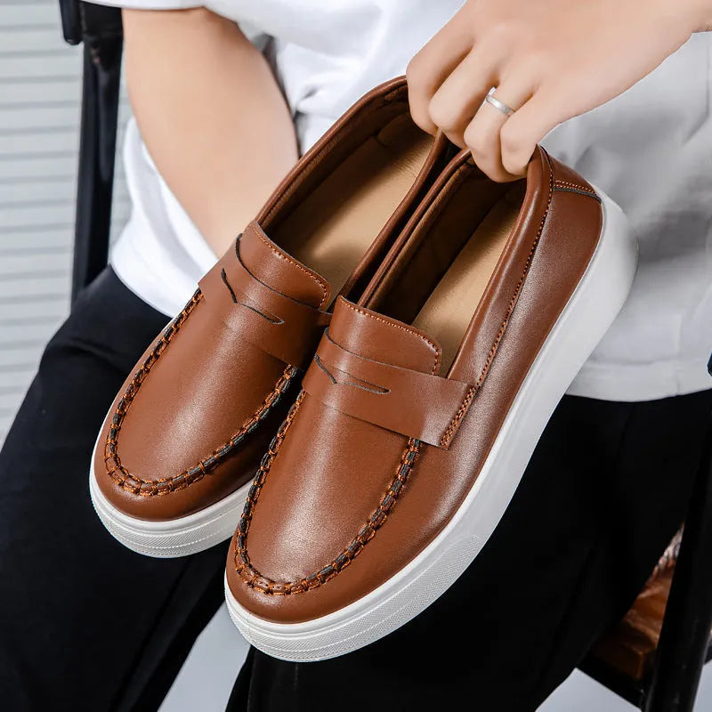 Men's casual slip-on loafers in PU leather with round toe, shown in black and white colour