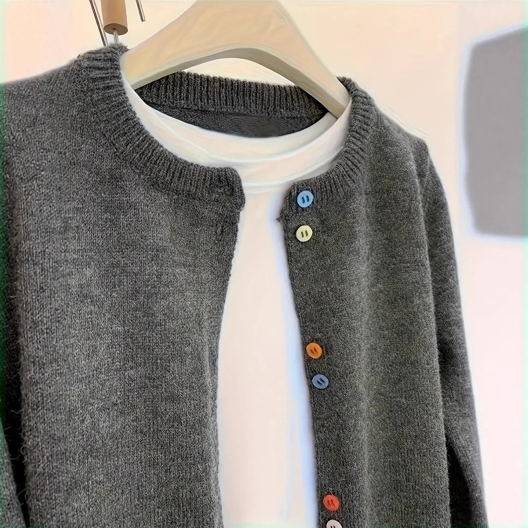 Dark grey women's button-front cardigan sweater for commute and workwear layering