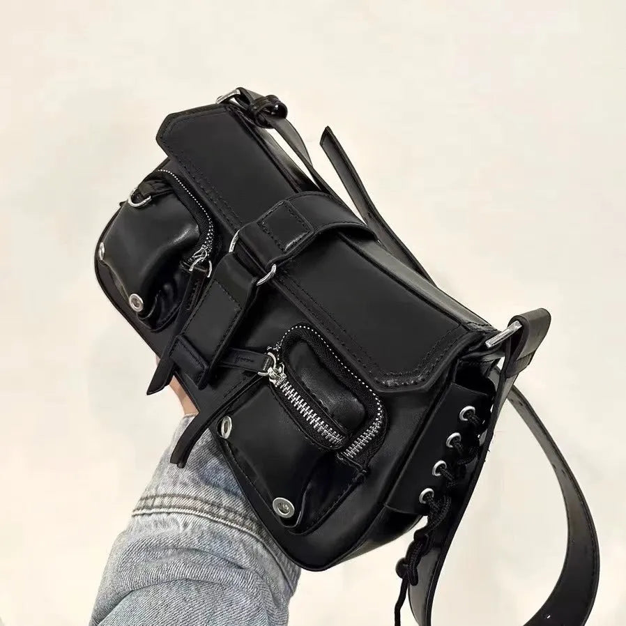 Black baguette-style women's messenger bag with a single crossbody strap