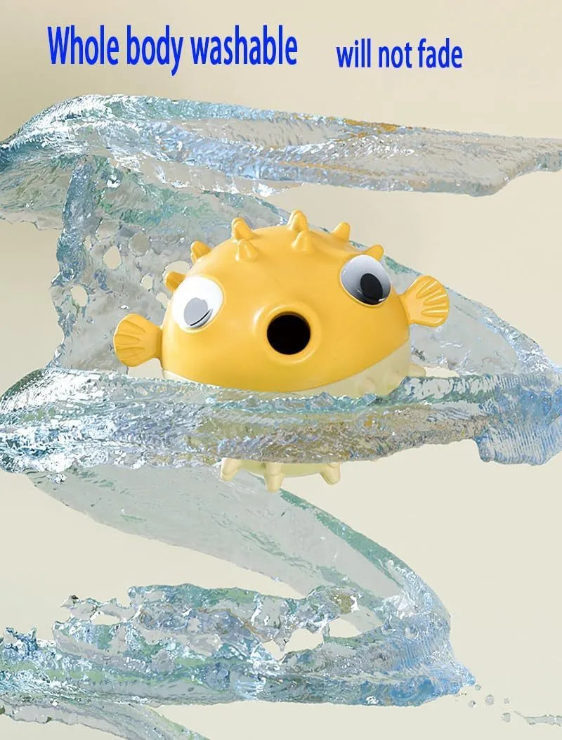 Green fish-shaped dog toy with treat dispensing cavity and raised surface particles