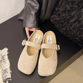 Women's flat closed toe half slipper in apricot colour with square toe and rubber sole.