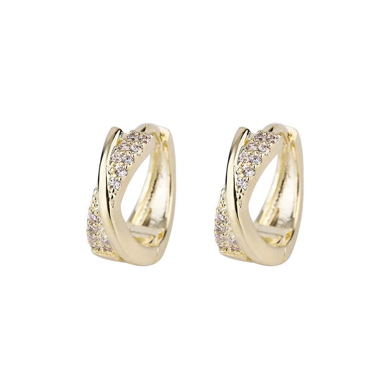 Geometric copper earrings with zircon treatment in 14K yellow colour