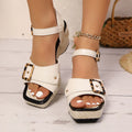 Women's white chunky heel sandals with square toe and metal buckle closure on rubber sole