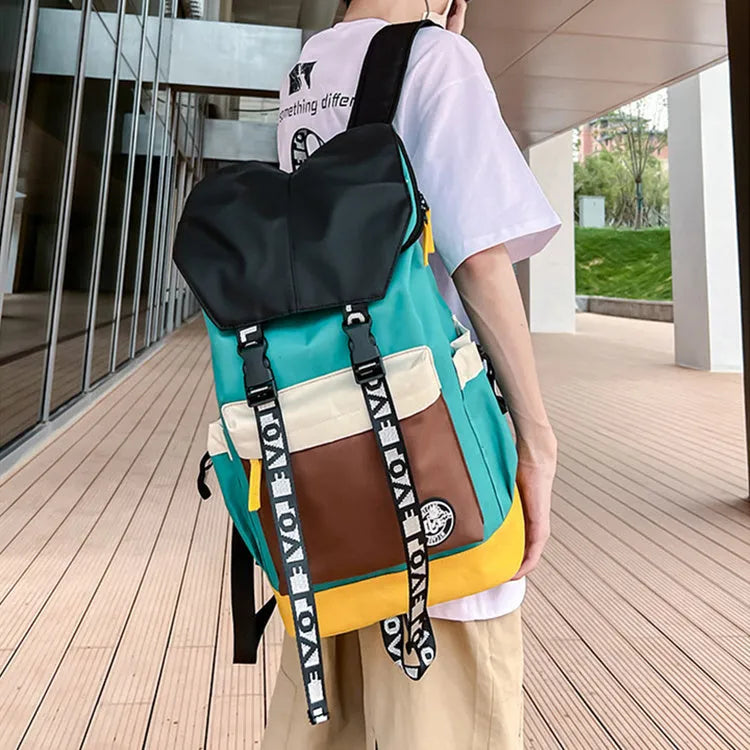 Oxford cloth backpack in black, green or red with 32cm width and 46cm height dimensions