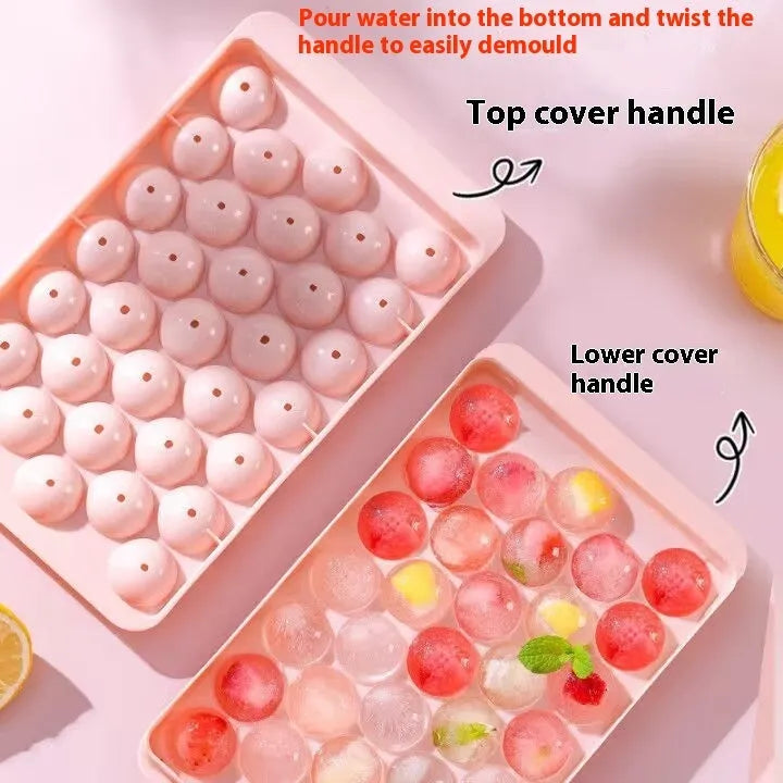 Blue round silicone ice cube tray with 33 grids and a clear lid, shown next to pink version