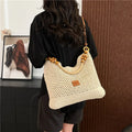 Knitted beach tote bag with crossbody strap showing stitching details and bucket shape