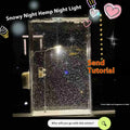 DIY snowy landscape night light kit showing components and assembled desktop decor with LED lights.