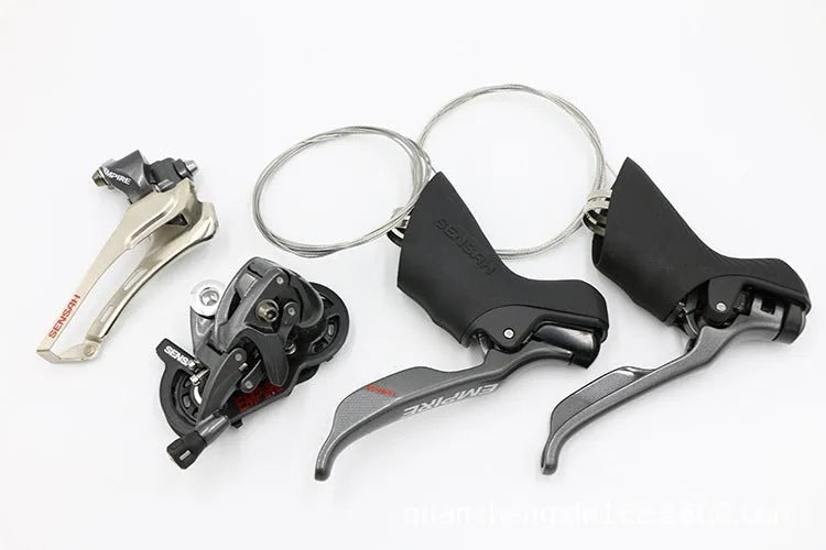 Road bike transmission kit showing aluminium alloy manual shifters, front derailleur and short leg rear derailleur for 11-speed upgrades.