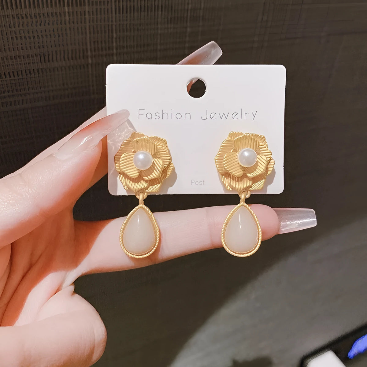 Gold Hong Kong style flower stud earrings with needle rose pearl design and opal stones
