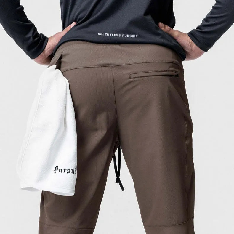 Men's grey quick-dry running pants with ankle-tied cuffs for fitness workouts
