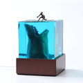 Crystal clear epoxy resin shark surfing night light ornament in modern minimalist style