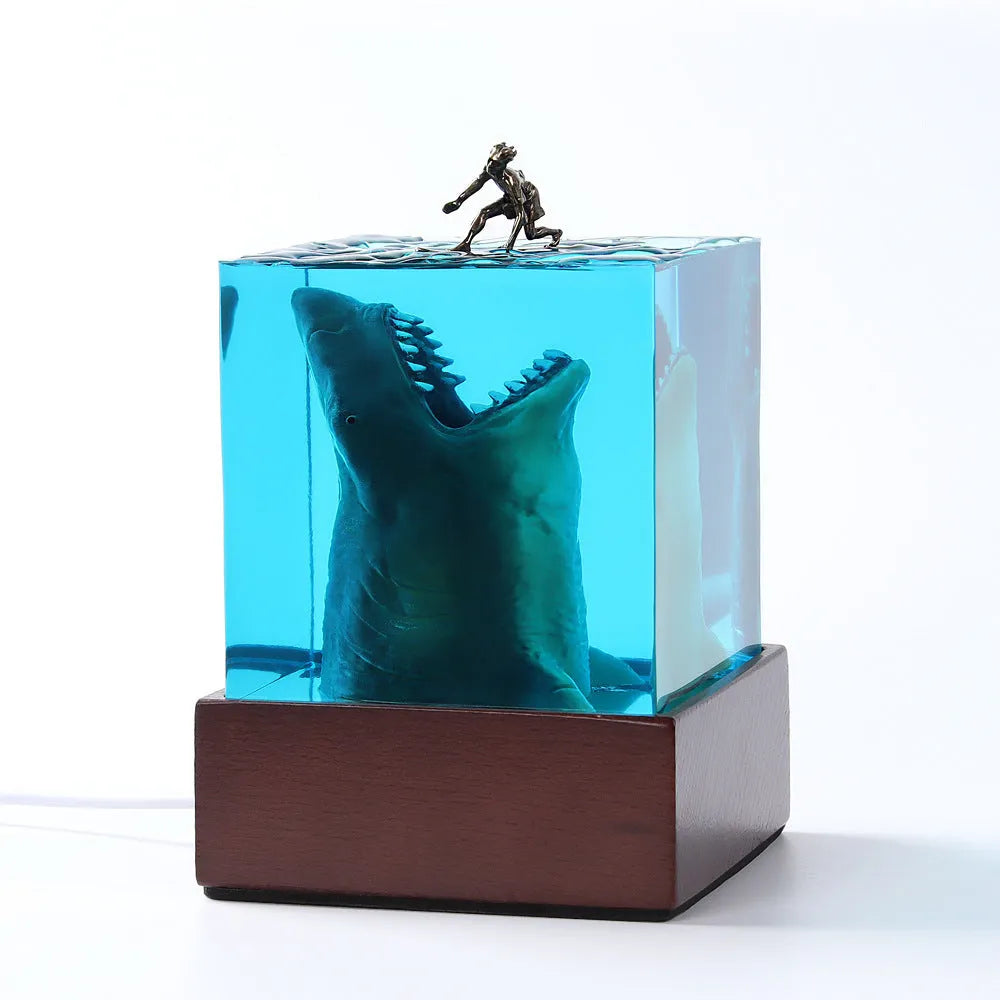 Crystal clear epoxy resin shark surfing night light ornament in modern minimalist style