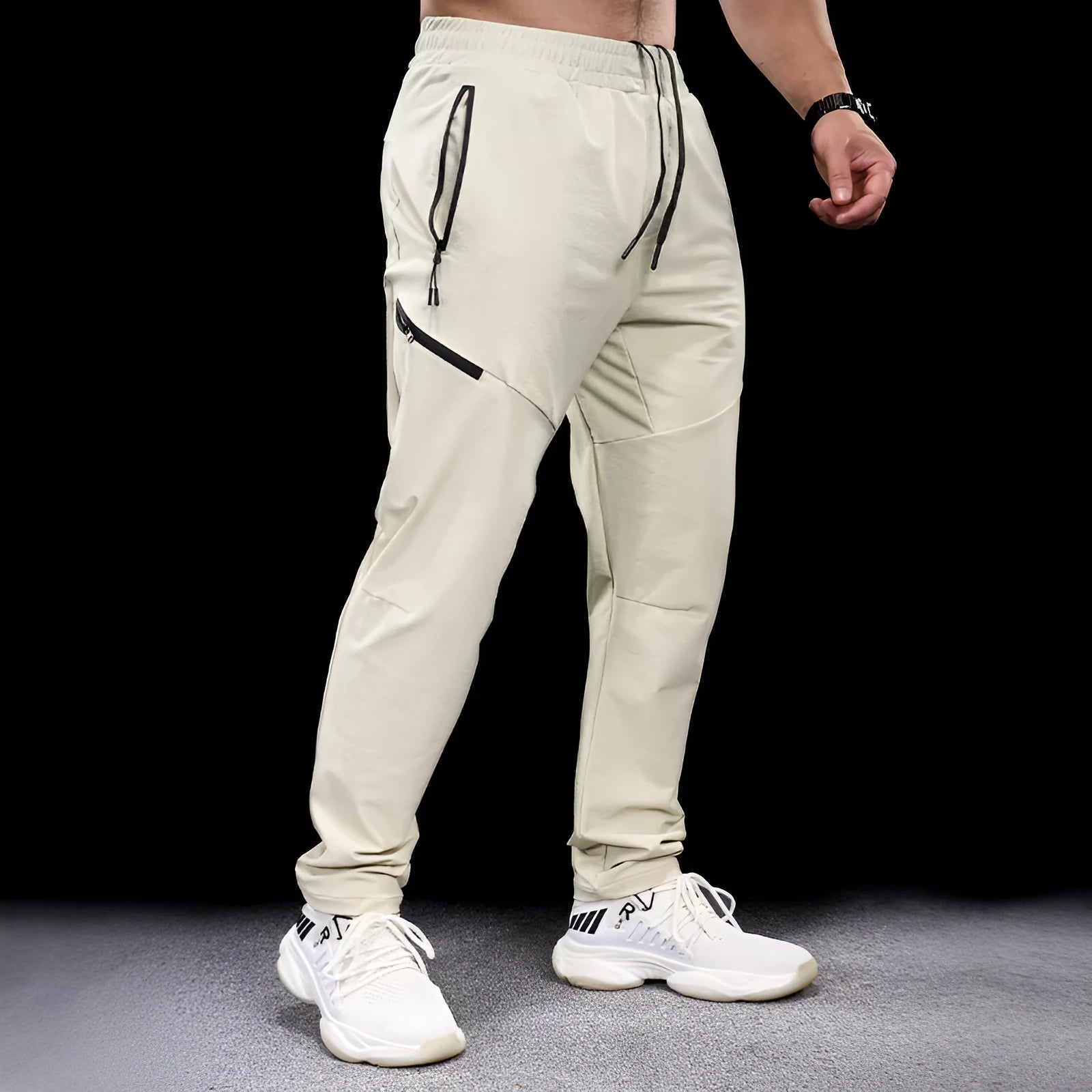 Men's waterproof quick-dry nylon workout trousers in multiple colours on a size chart.