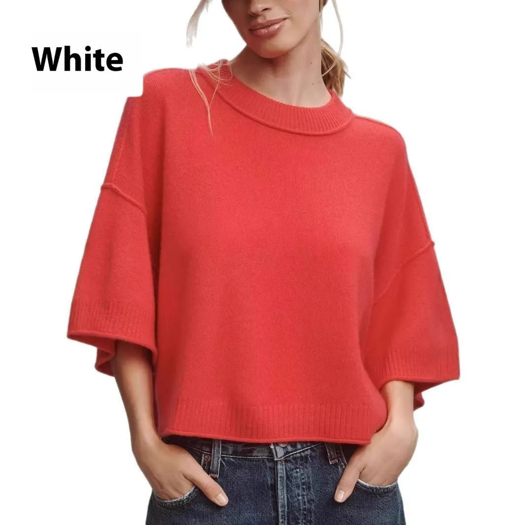 Red short sleeve viscose t-shirt with a cropped, exposed navel hem on a mannequin.