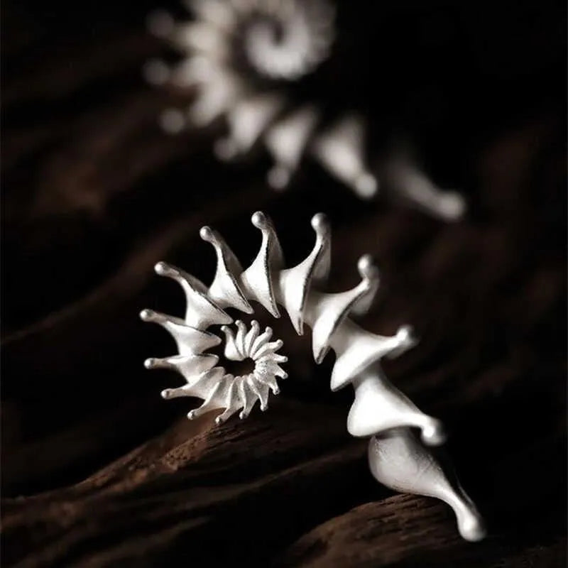 Alloy conch stud earrings with three-dimensional irregular design and matte electroplated finish
