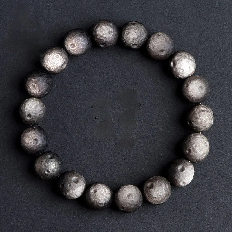 Natural obsidian crater ball bracelet with ground texture beads in silver or golden meteorite colours