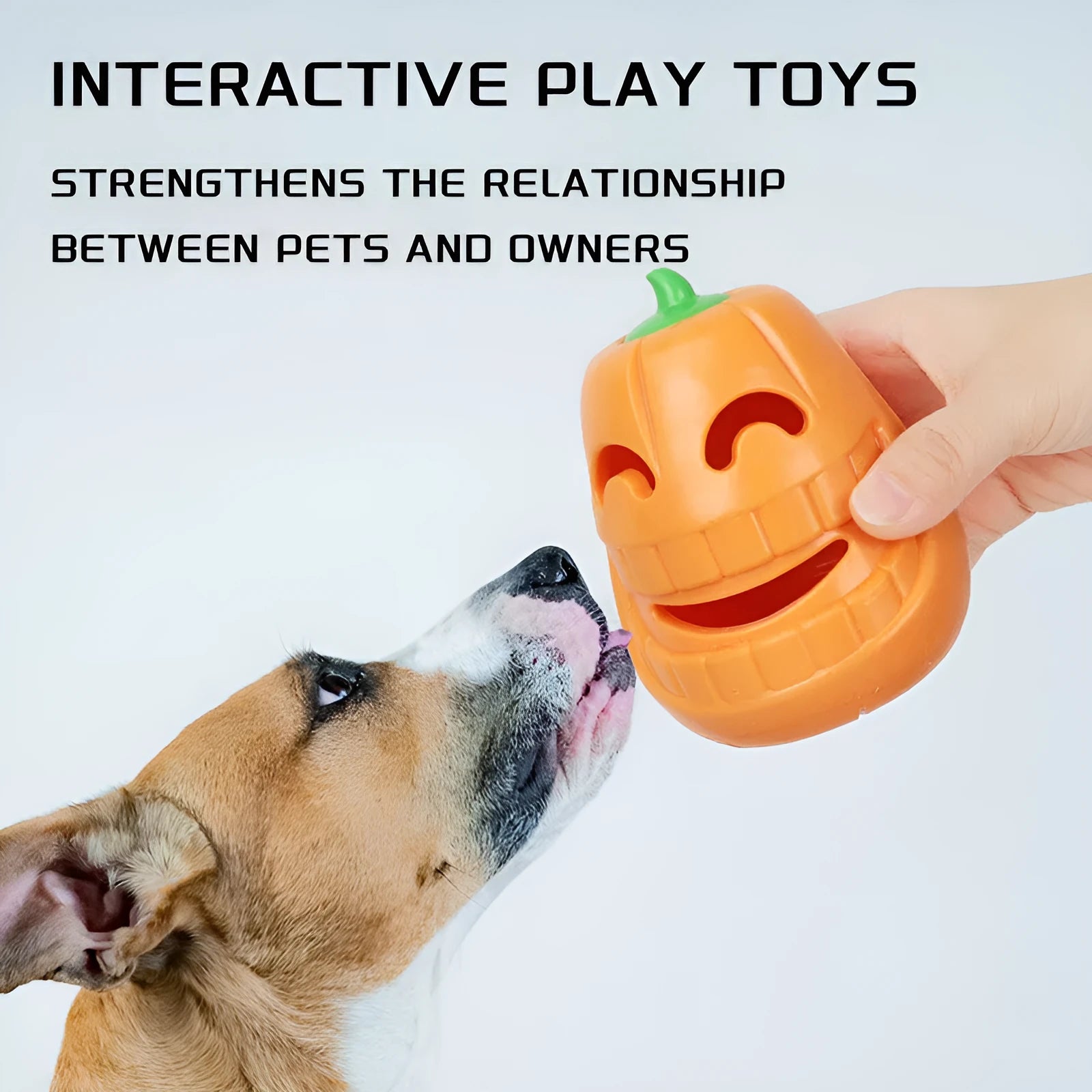 Orange Halloween pumpkin shaped interactive dog chew toy with treat dispensing funnel