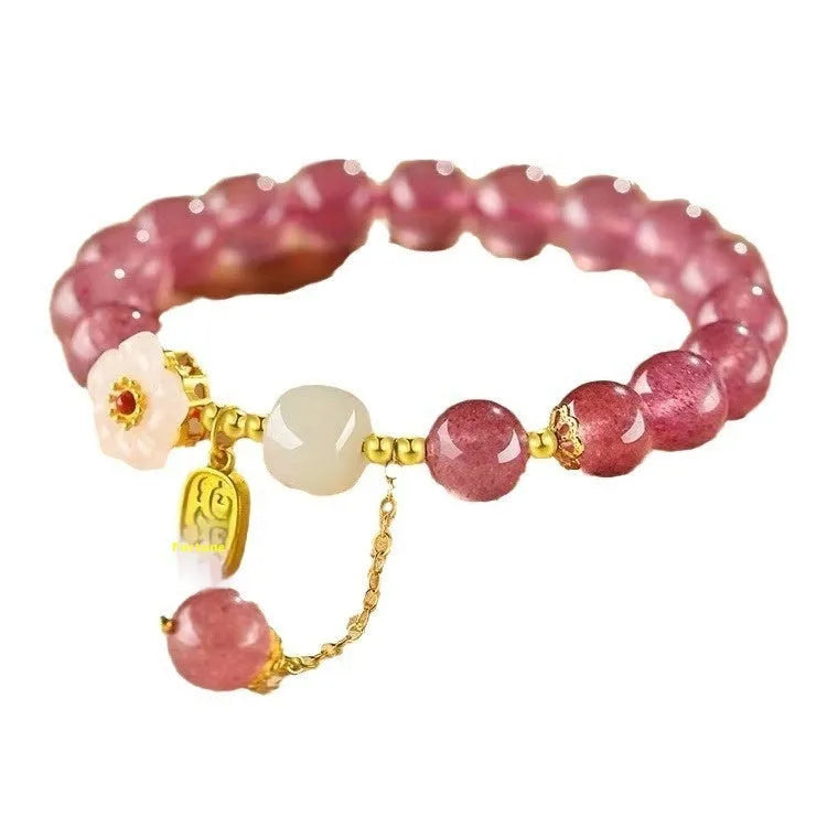Handmade strawberry quartz crystal bracelet with Hetian jade peach blossom charm for women