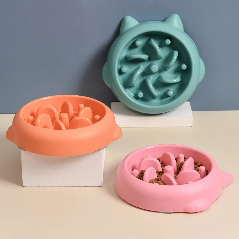 Bone shaped slow feeder dog bowl in green colour with raised internal obstacles