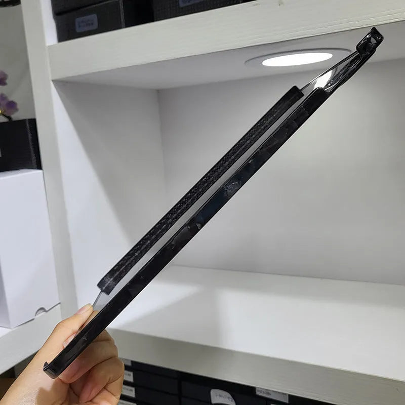 Carbon fibre protective cover for iPad Pro 11 showing embossed plaid texture
