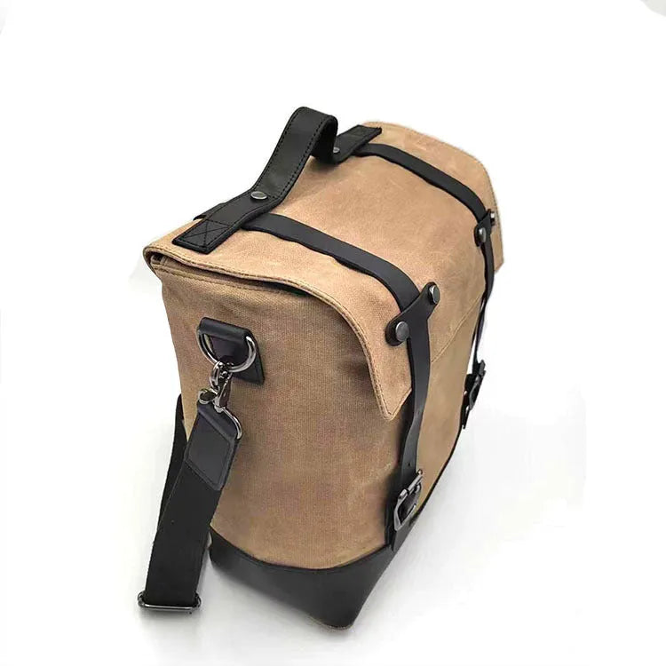 Motorcycle side bag made of waterproof canvas with cowhide accents measuring 300x280x150mm