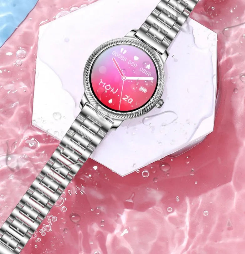 AK38 ladies smart watch with stainless steel band on wrist, showing its 1.09 inch colour screen.