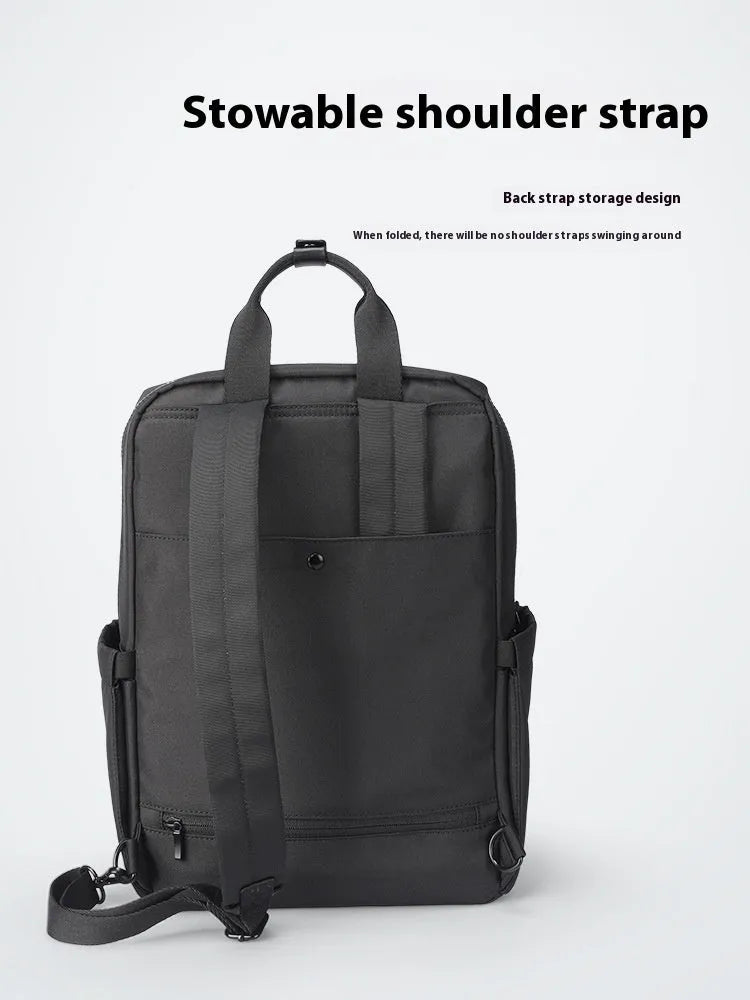 Black oxford cloth computer backpack with multiple compartments showing 20-35 litre capacity