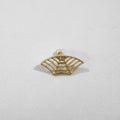 Geometric spider web design stud earrings in gold and silver electroplated metal.