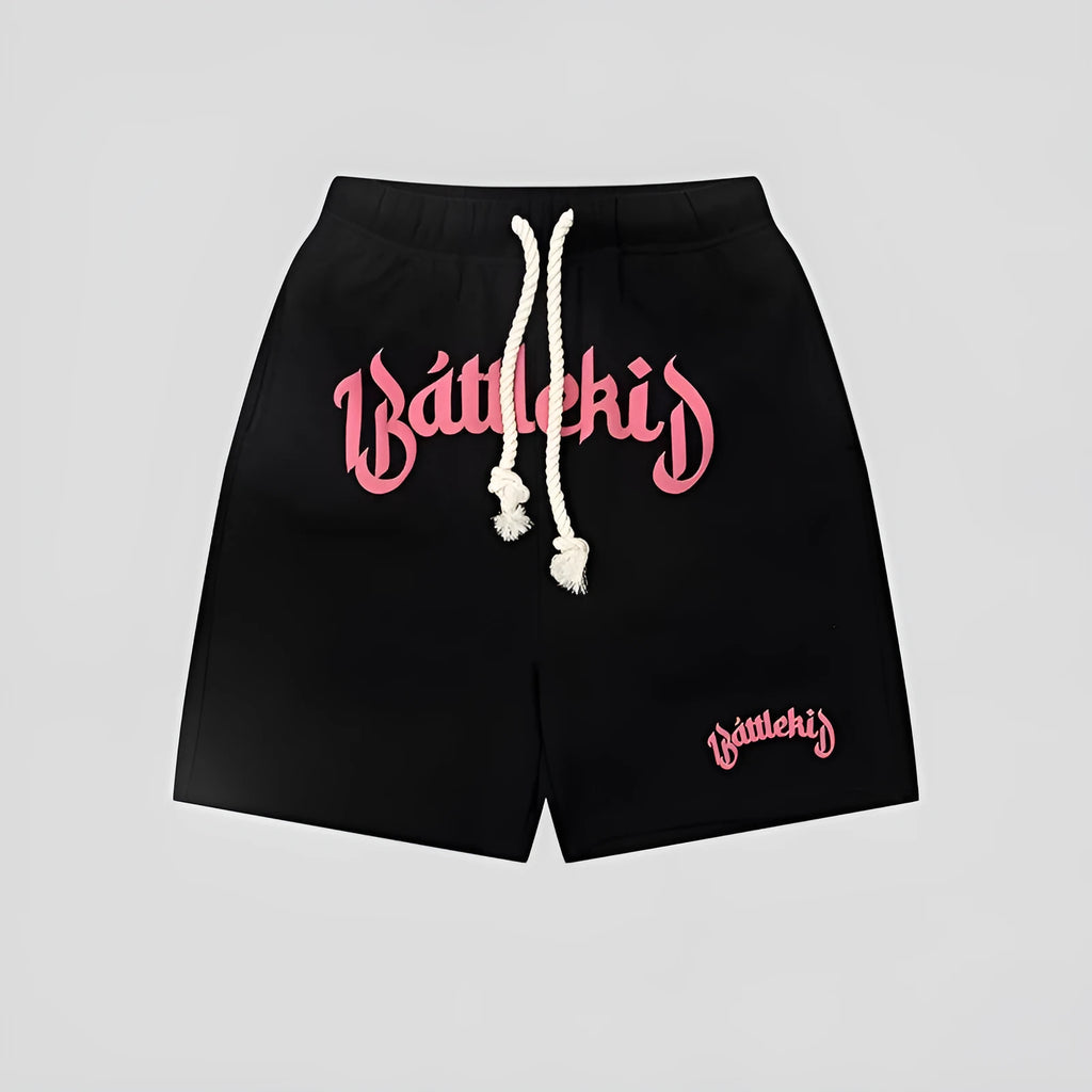 Loose fit cotton blended shorts in black, shown on a model for street style.