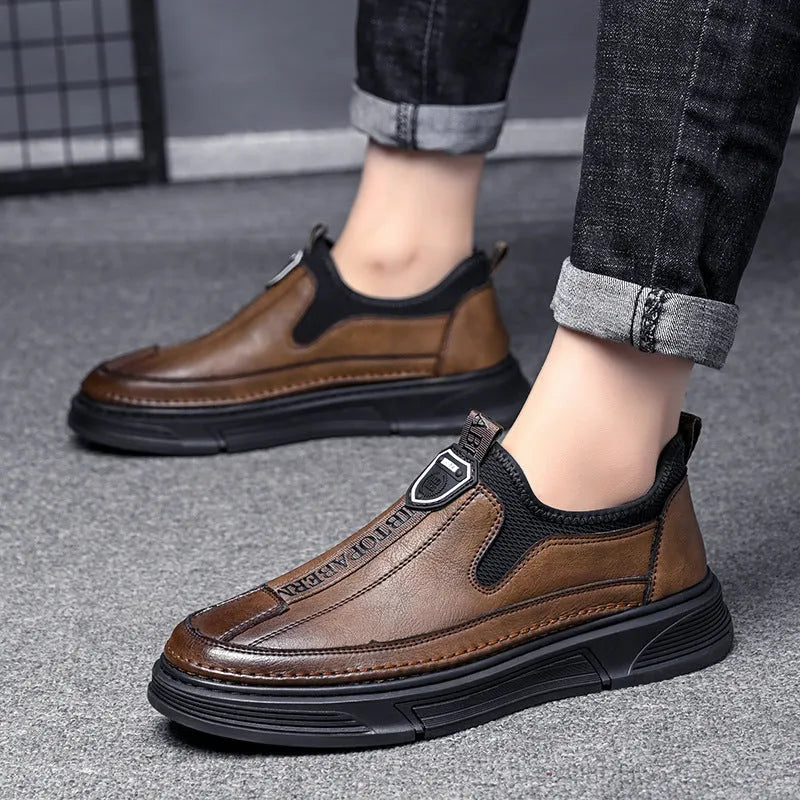 Men's solid black leather casual lace-up shoes with round toe on a white background.