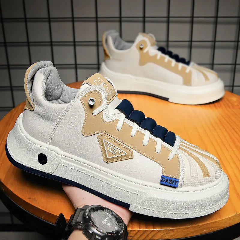Men's beige casual low-top sneakers with elastic band and leather stitch detail on microfiber upper.