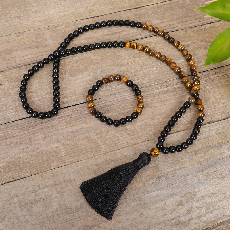 Tiger eye stone convertible tassel chain showing 81cm length and ball bead construction